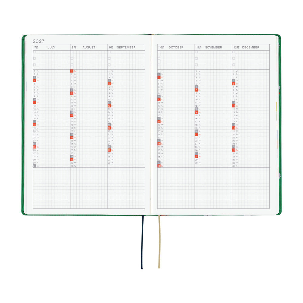 An open 2027 Hobonichi Techo HON hardcover planner showing a six-month overview from July through December, with two ribbon bookmarks on a white background.