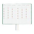 An open 2027 Hobonichi Techo HON hardcover planner showing a six-month overview from July through December, with two ribbon bookmarks on a white background.