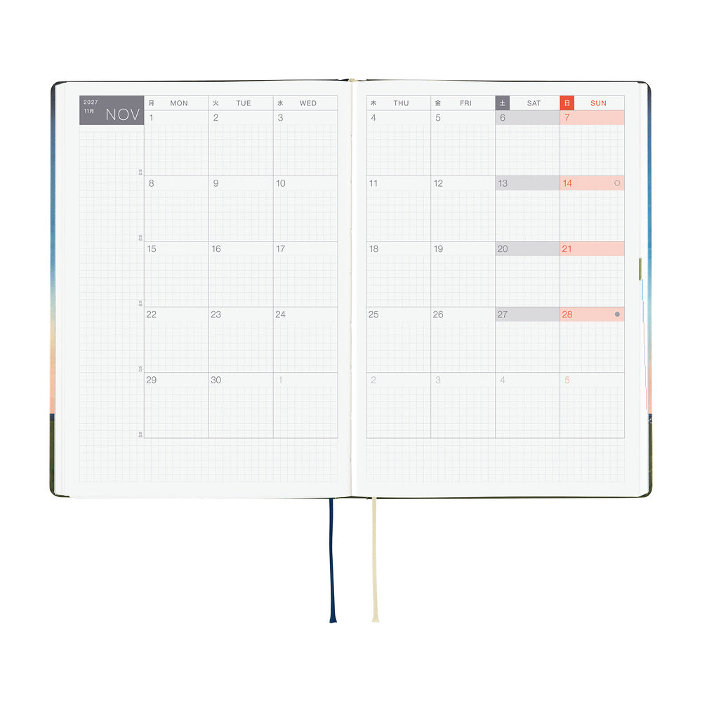 An open 2027 Hobonichi Techo HON hardcover planner showing a two-page monthly calendar layout for November, with two ribbon bookmarks hanging below on a white background.