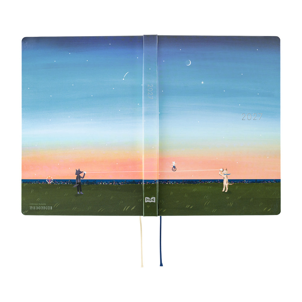 A flat open view of a 2027 Hobonichi Techo HON hardcover planner featuring Hiroko Kubota’s illustration of a cat and wolf using a string telephone across a grassy meadow at sunset, with a mouse riding a unicycle along the line beneath a starry sky and crescent moon.
