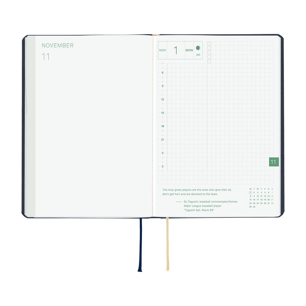 An open 2027 Hobonichi Techo HON hardcover planner showing the November start page beside a daily grid page, with two ribbon bookmarks hanging below on a white background.