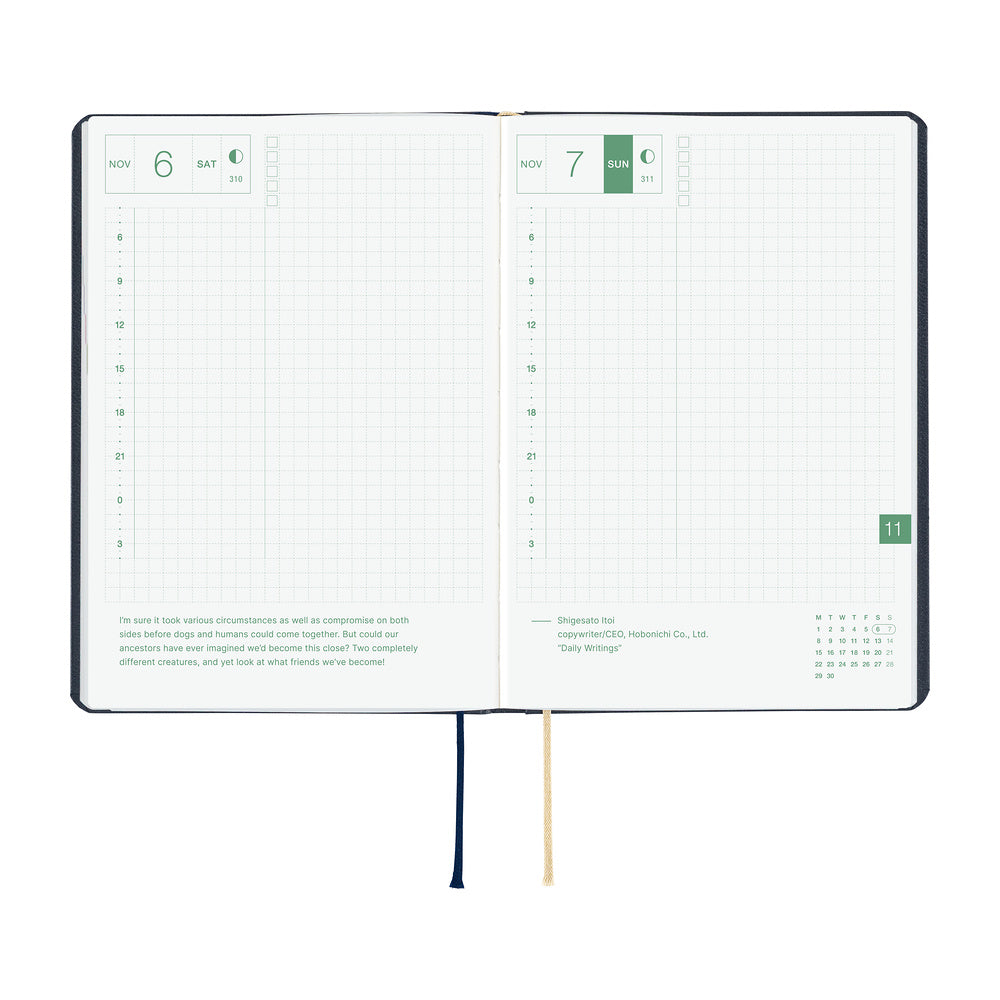 An open 2027 Hobonichi Techo HON hardcover planner showing two daily grid pages for November 6 and 7, with timelines, checkboxes, quotes, and two ribbon bookmarks on a white background.