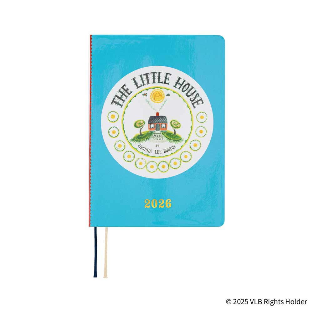 Hobonichi A6 HON 2026 planner with light blue hardcover with white circle and illustrated house and daisies in center