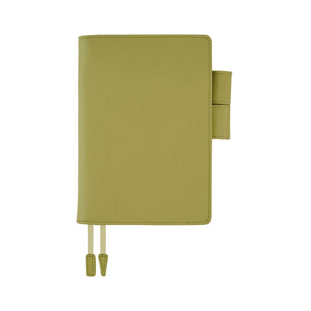 Light green leather cover for Hobonichi Techo A6 planner on white ground