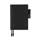 Black leather cover for Hobonichi Techo A6 planner on white background
