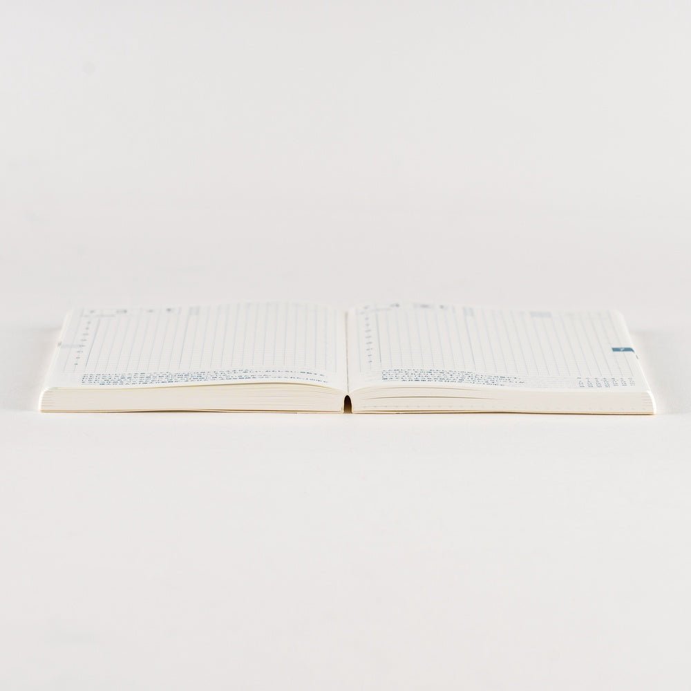 Open Hobonichi Techo 2026 Original A6 Spring Start planner laying flat on white surface