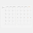 Hobonichi A6 Planner with monthly spread for November 2027 on white background