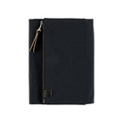 Black fabric Tragen zippered cover for Hobonichi Techo Cousin A5 planner on white background