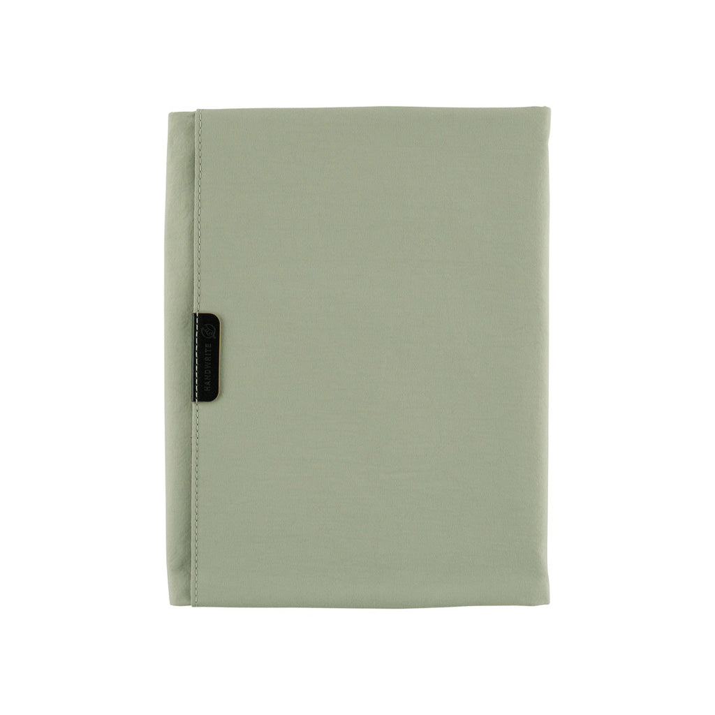 Oakmoss green fabric Tragen zippered cover for Hobonichi Techo Cousin A5 planner on white background