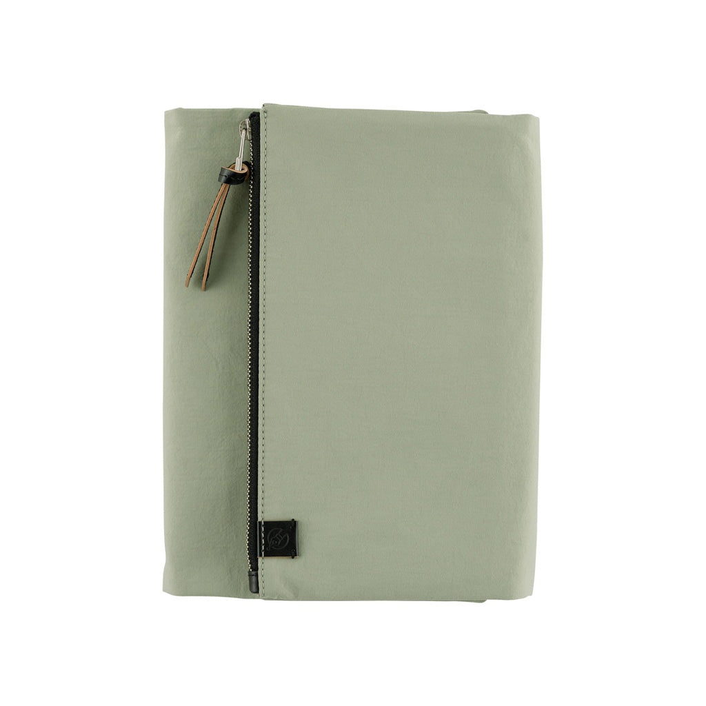 Oakmoss green fabric Tragen zippered cover for Hobonichi Techo Cousin A5 planner on white background