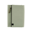 Oakmoss green fabric Tragen zippered cover for Hobonichi Techo Cousin A5 planner on white background