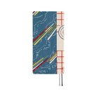 Back of Hobonichi Techo Unsodo spring start 2026 Weeks planner navy background and abstract colorful design on white surface