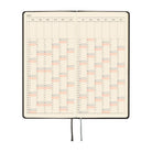 An open 2027 planner showing a yearly spread with cream colored pages. 