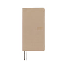 A planner with a sandy beige softcover that is flexible and slightly puffy. The year 2027 is embossed in gold on the front. 