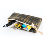 A Hobonichi Tragen cover for Weeks in the color Bitter Plaid.