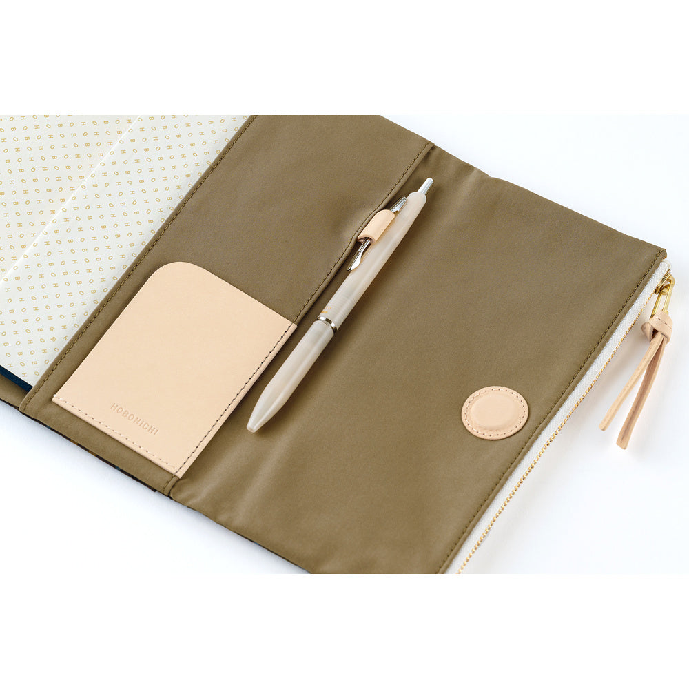 A Hobonichi Tragen cover for Weeks in the color Bitter Plaid.