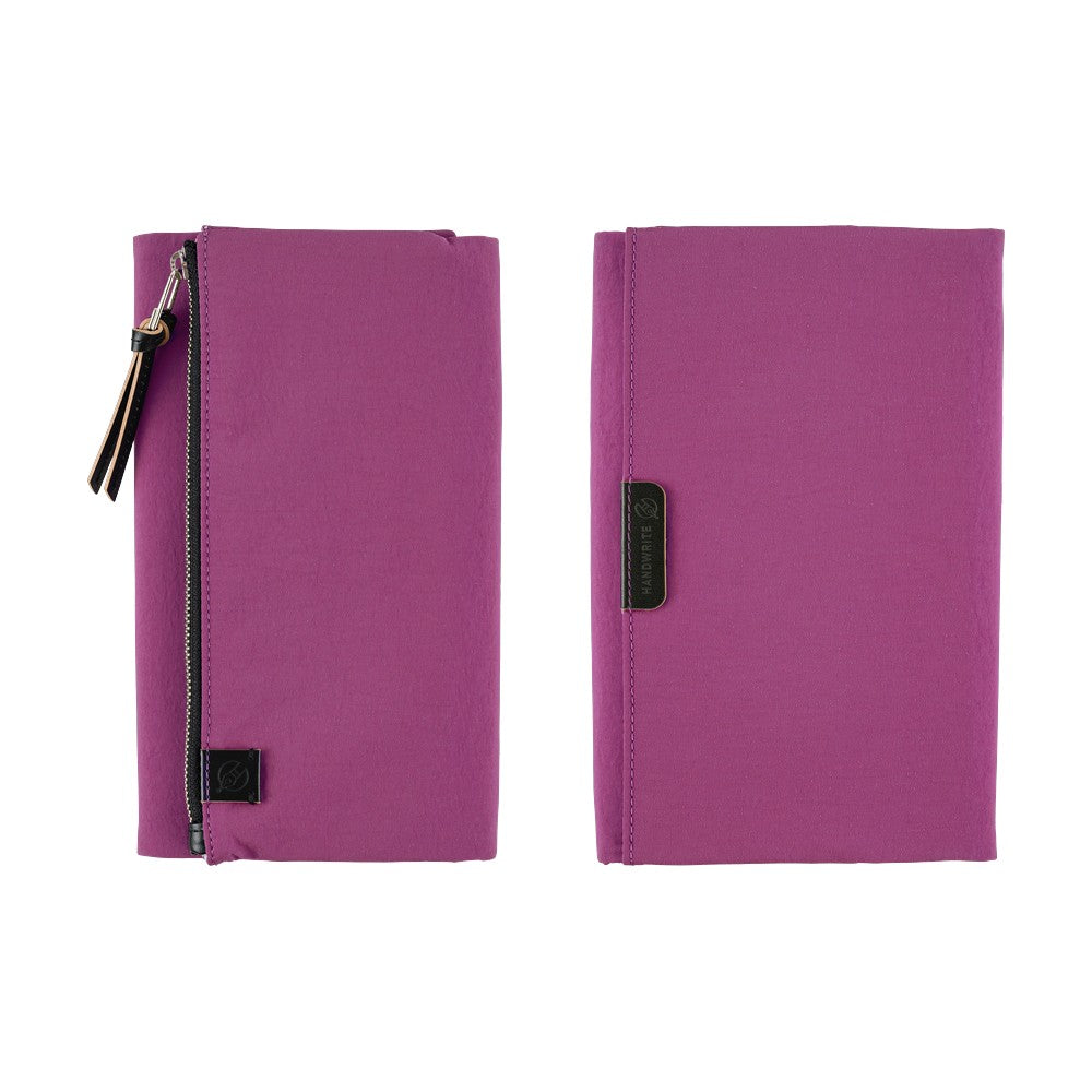 A Hobonichi Weeks Tragen cover in the color Purple.
