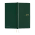 The exterior of a dark green leather covered planner. The date 2027 is embossed on both the spine and cover. 