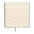 An open planner showing a two-page yearly calendar spread from January to December 2027.