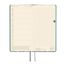An open weekly planner spread on a white background, showing a left column with dates and a right page with a light grid. 