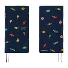 A 2027 Hobonichi Weeks Mega featuring Bow & Tie fabric woven with candy designs.