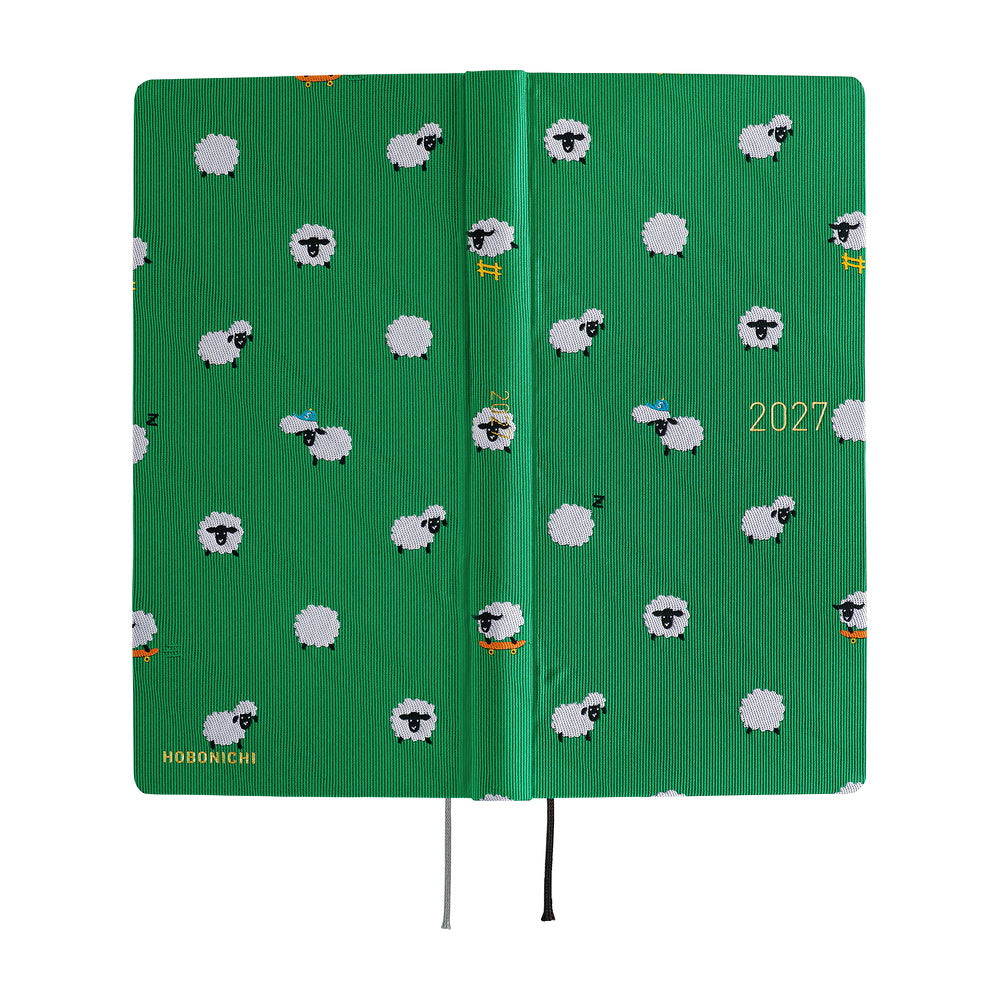 A 2027 Hobonichi Mega Weeks with a Bow & Tie cover featuring sheep.