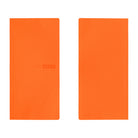 A front and back view of a bright orange planner with a subtle embossed logo on the front that reads "2027 MEGA".
