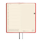 A 2027 Hobonichi Mega Weeks planner in the color Poppy Red