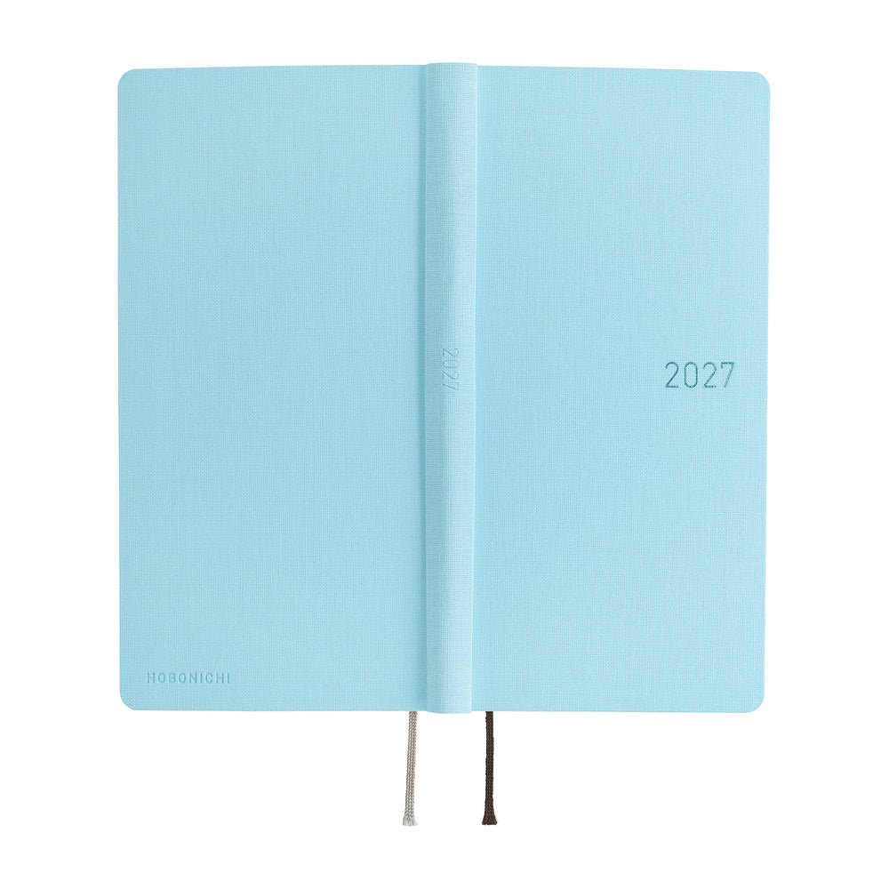 The exterior of a 2027 planner with a light blue cover that has a slight sheen. The year 2027 is debossed on the front in blue foil.