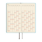 An open 2027 planner showing a yearly calendar in a vertical format on cream-colored pages. 