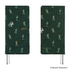 A front and back view of a dark green planner covered with woven "bow & tie" fabric featuring Moomin characters and the year '2027' in gold foil.