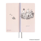 A pale pink Moomin 2027 daily planner shown open, featuring black line-art illustrations of Moomin characters.