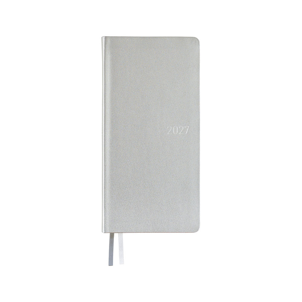 A slim 2027 daily planner with a silver leather cover, featuring a thin ribbon bookmarks, shown against a plain white background.