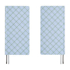A 2027 fabric-covered planner with a simple blue, white, and green plaid pattern across the cover.