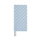 A 2027 fabric-covered planner with a simple blue, white, and green plaid pattern across the cover.