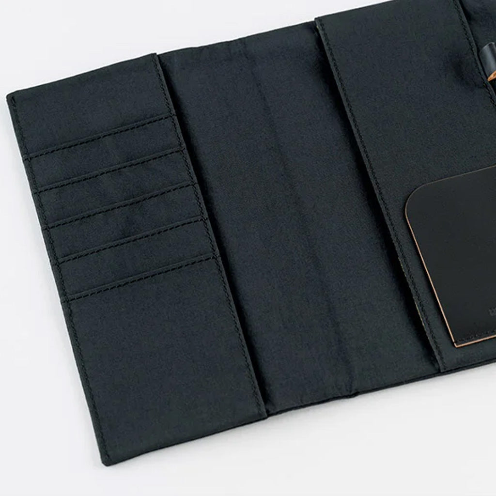 Black Hobonichi Techo Weeks Tragen cover on white background
