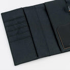Black Hobonichi Techo Weeks Tragen cover on white background