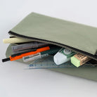 Light green fabric Tragen zippered cover for Hobonichi Techo Weeks planner with stationery accessories 