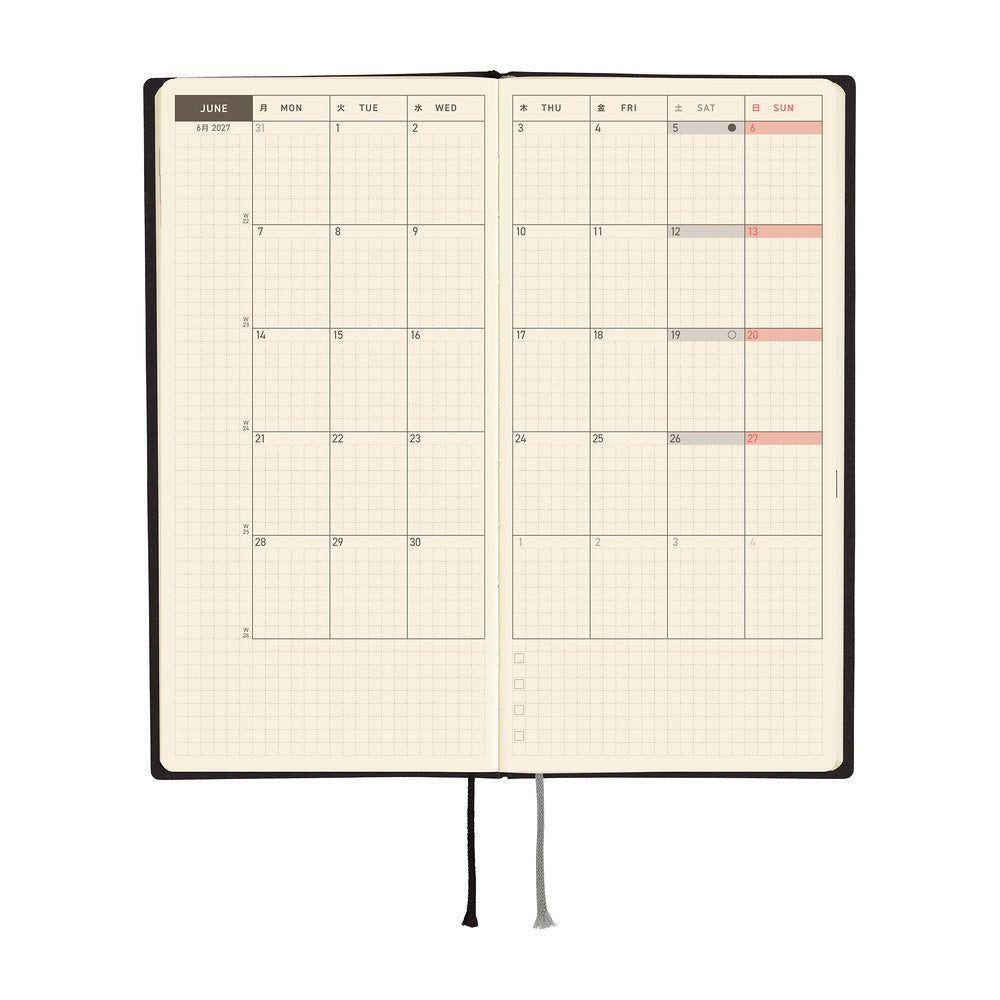 An open monthly planner with two grid pages showing a calendar layout for June, with black and gray ribbon bookmarks hanging below on a plain white background.