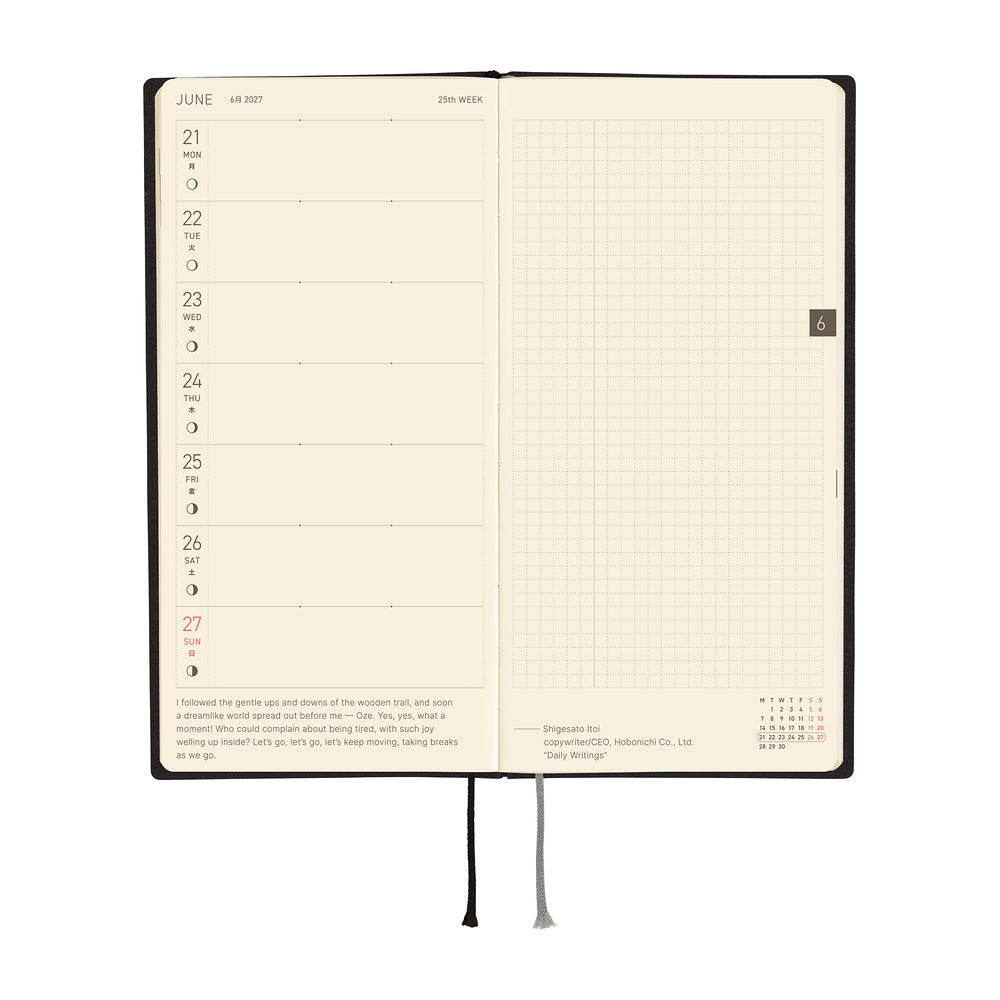 An open planner with cream-colored pages, showing a weekly layout on the left and a grid section on the right, photographed on a plain white background.