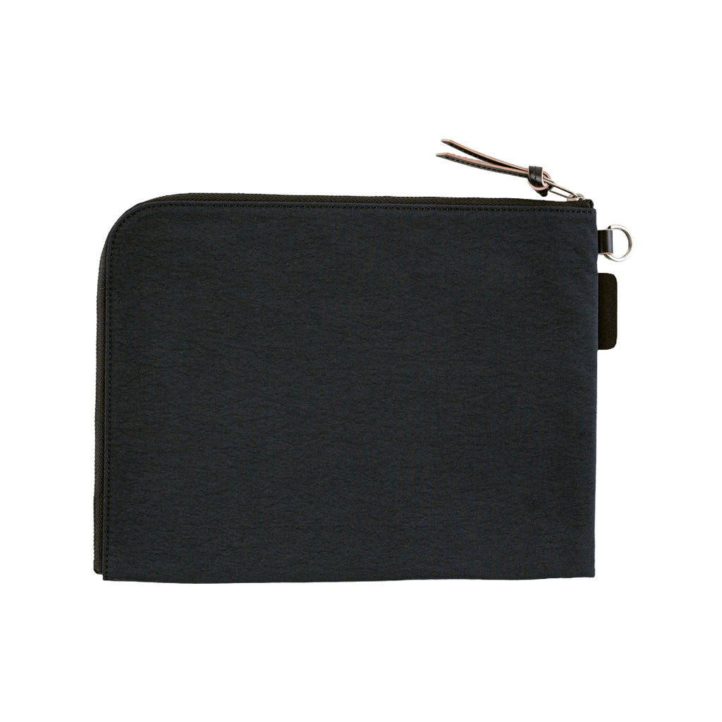 A black A5 zippered tragen flat pouch closed on white background