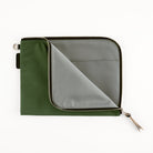 An olive green zippered pouch with a silver zipper and a gray interior lining, shown open on a plain white background.