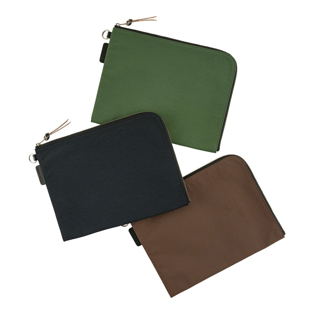 Three A5 zippered tragen flat pouches closed on white background