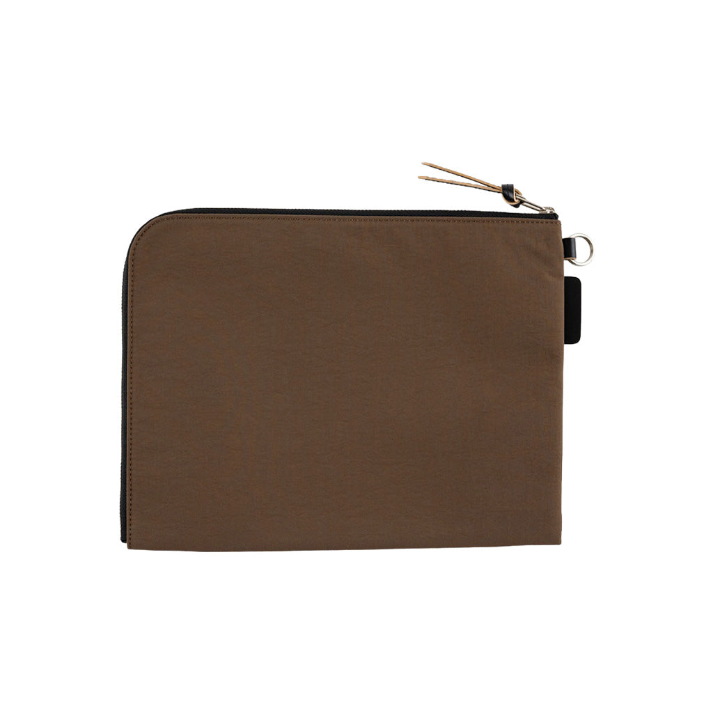 A brown A6 zippered Tragen flat pouch on white background