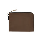 A brown A6 zippered Tragen flat pouch on white background