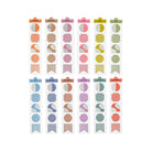 A set of twelve planner stickers in various colors and patterns, arranged in a grid on a white background.
