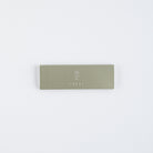 Gray TSUKI no IRO case for translucent tile sticky notes on white background