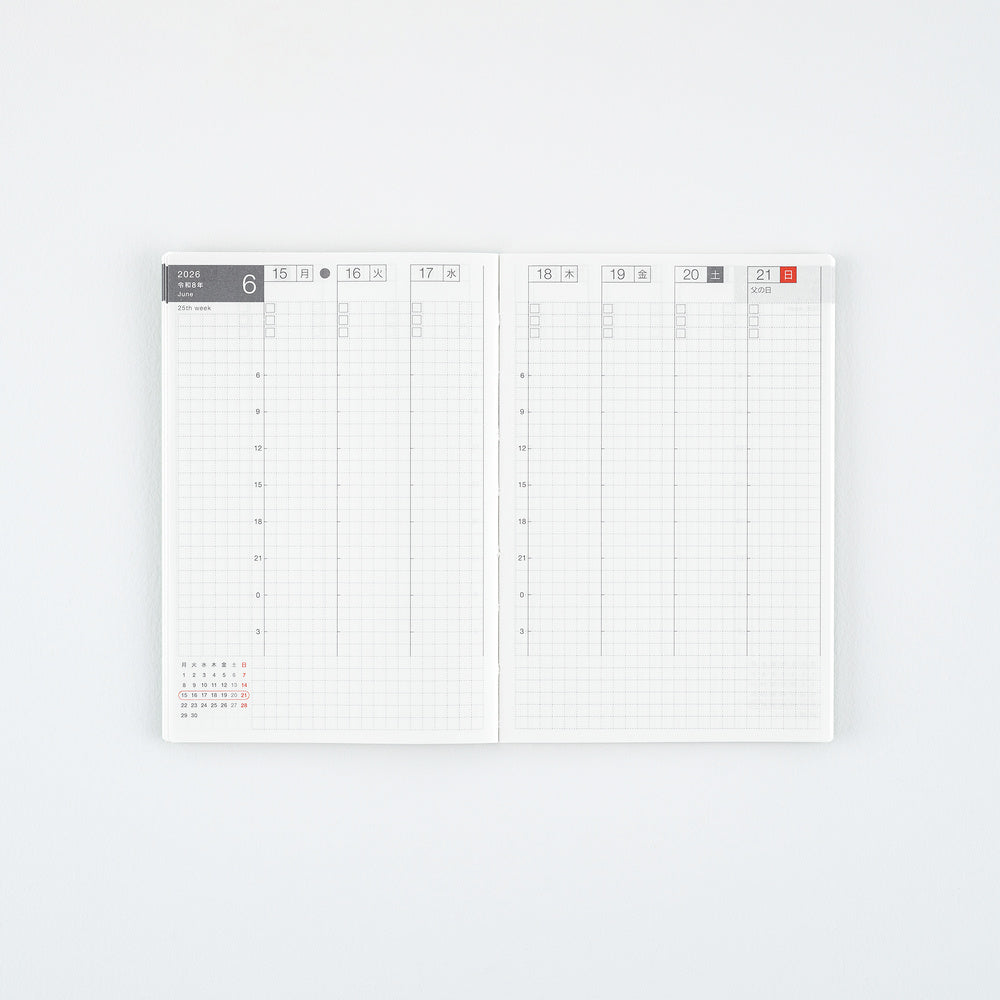 An open weekly planner with two grid pages, featuring a minimalist white design with light gray lines and small red date highlights, photographed on a clean white background.