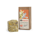 Bar of Hogwash SallyeAnder stain removing soap next to packaging on white background