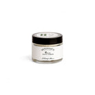 Small tub of D. R. Harris hold hair cream with black screw lid on white background